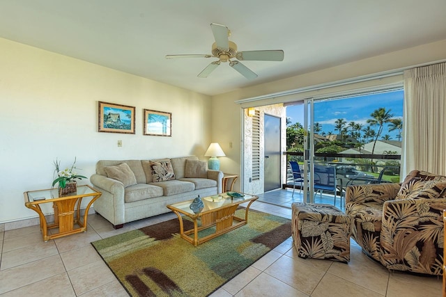 living room featuring light tile patterned flooring and ceiling fan