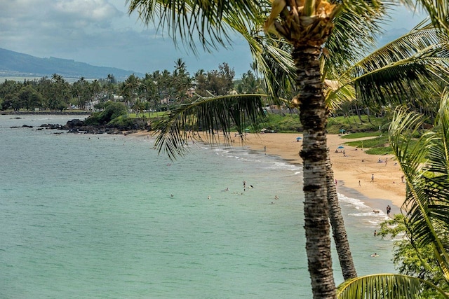 property view of water featuring a mountain view and a view of the beach