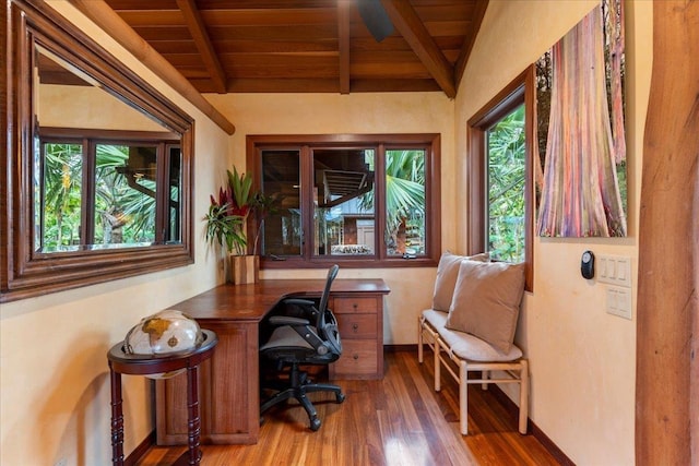 office space with wood-type flooring, vaulted ceiling with beams, and wood ceiling