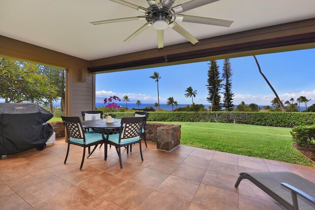 view of patio with grilling area and ceiling fan