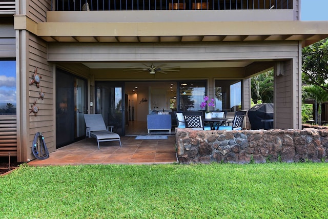 view of patio featuring an outdoor hangout area, ceiling fan, and grilling area