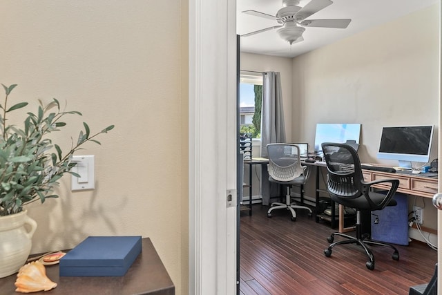 office area with ceiling fan and dark hardwood / wood-style floors