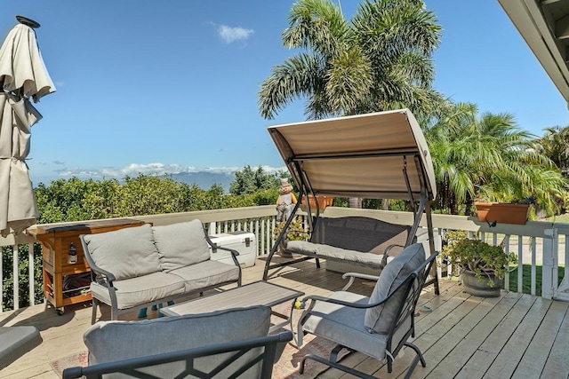 deck with an outdoor hangout area