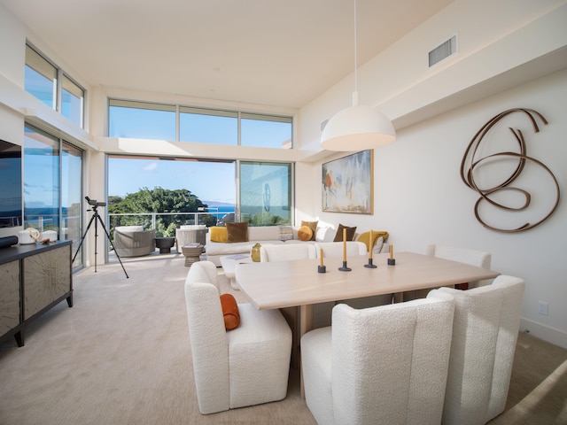 view of carpeted dining area