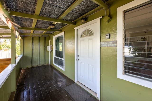 property entrance with a porch