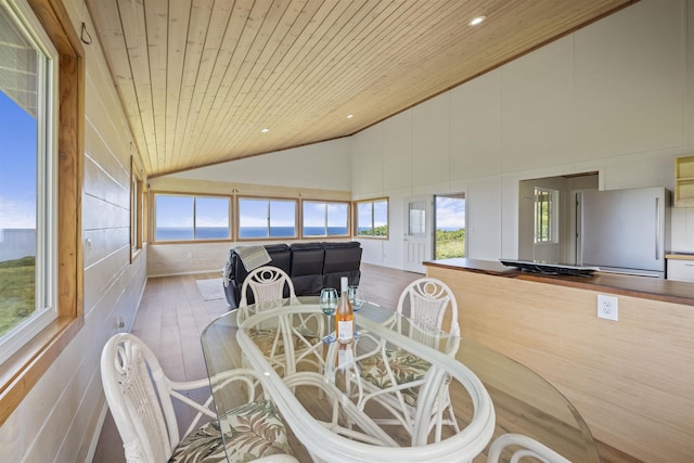 34701 Piilani Hwy, Hana, HI 96713 - dining area with high vaulted ceiling, wood ceiling, wood finished floors, and recessed lighting