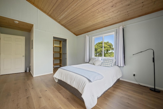 34701 Piilani Hwy, Hana, HI 96713 - bedroom featuring wooden ceiling, vaulted ceiling, baseboards, and wood finished floors