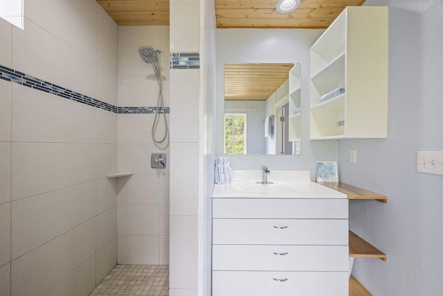 34701 Piilani Hwy, Hana, HI 96713 - bathroom featuring wooden ceiling, a tile shower, and vanity