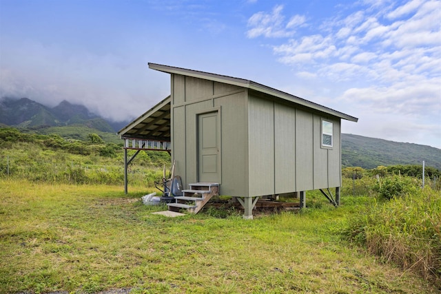 34701 Piilani Hwy, Hana, HI 96713 - view of outbuilding with a mountain view and entry steps