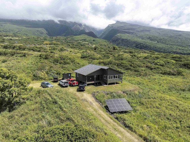 34701 Piilani Hwy, Hana, HI 96713 - view of subject property with a mountainous background and a heavily wooded area