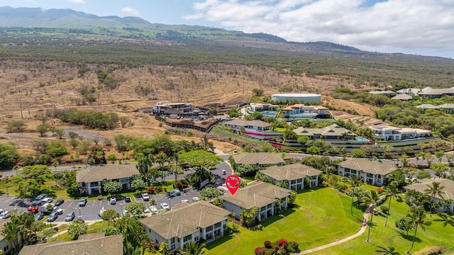 drone / aerial view featuring a mountain view