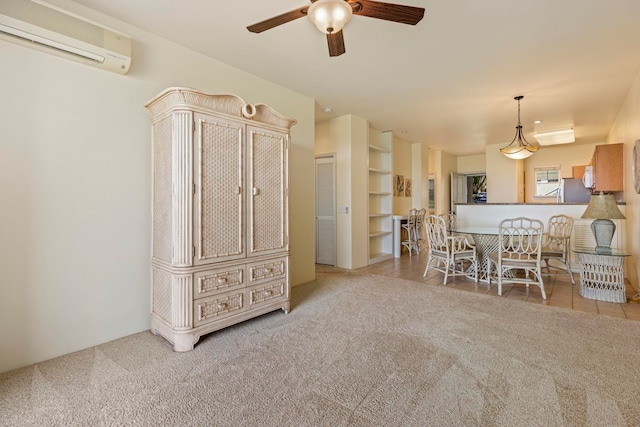 dining room featuring ceiling fan, a wall mounted AC, and light colored carpet