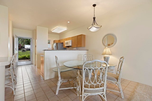 view of tiled dining area