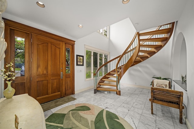 212 Crestview Rd, Lahaina, HI 96761 - entrance foyer featuring stairway, plenty of natural light, recessed lighting, light marble finish floors, and arched walkways
