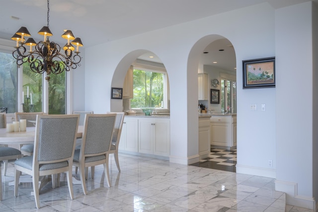 212 Crestview Rd, Lahaina, HI 96761 - dining space with a chandelier and baseboards