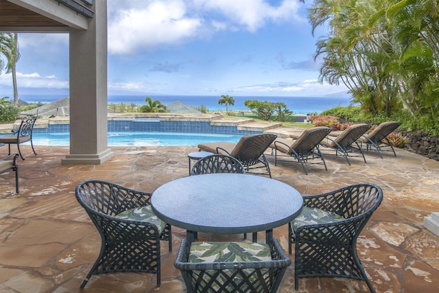 212 Crestview Rd, Lahaina, HI 96761 - view of patio / terrace featuring an outdoor pool, outdoor dining space, and a water view