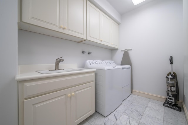 212 Crestview Rd, Lahaina, HI 96761 - washroom with cabinet space, independent washer and dryer, and light marble finish flooring