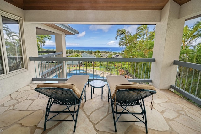 212 Crestview Rd, Lahaina, HI 96761 - balcony with view of pool area and a water view