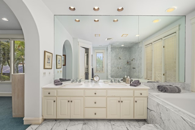 212 Crestview Rd, Lahaina, HI 96761 - bathroom with a garden tub, a marble finish shower, double vanity, recessed lighting, and marble look tiles