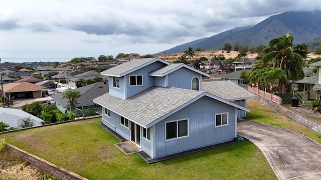 birds eye view of property with a residential view and a mountain view