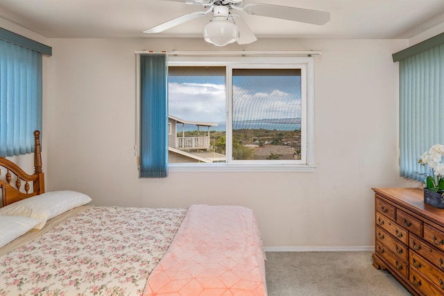 1125 Hoomau Pl, Wailuku, HI 96793 - bedroom featuring carpet flooring, baseboards, and a ceiling fan