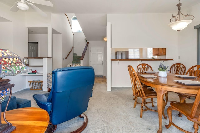 1125 Hoomau Pl, Wailuku, HI 96793 - carpeted dining area featuring ceiling fan and stairs