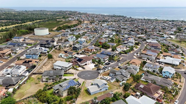 aerial view with a residential view and a water view