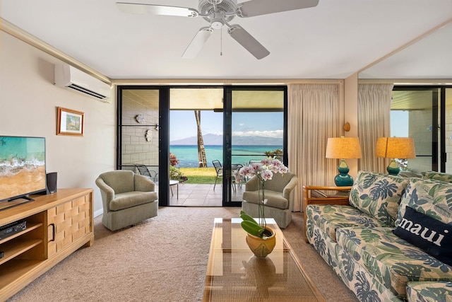 carpeted living room with ceiling fan, expansive windows, a water view, and a wall unit AC