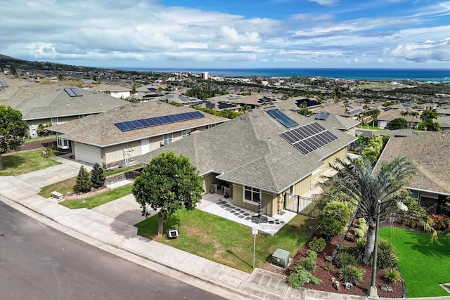 bird's eye view with a water view