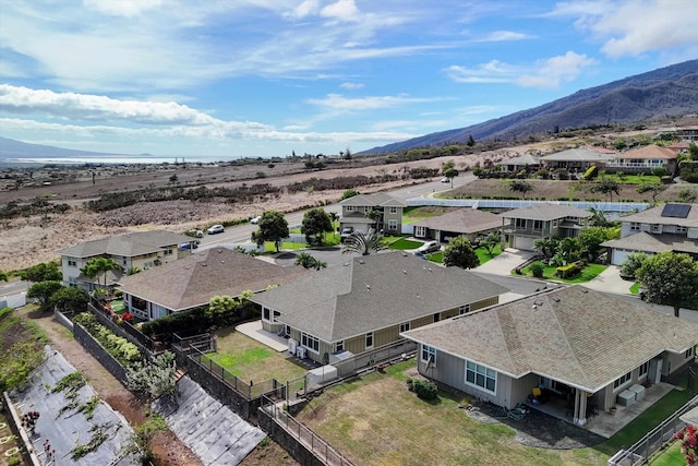 birds eye view of property featuring a mountain view