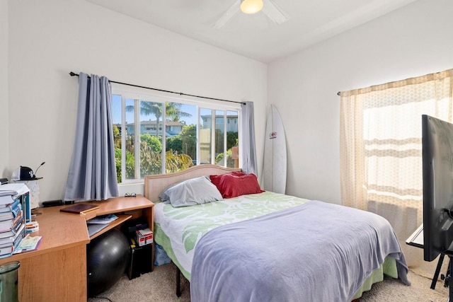 carpeted bedroom featuring ceiling fan