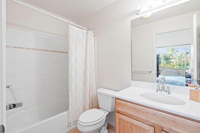 full bathroom featuring vanity, toilet, and shower / bathtub combination with curtain