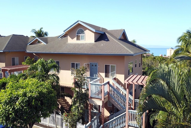 exterior space with a water view