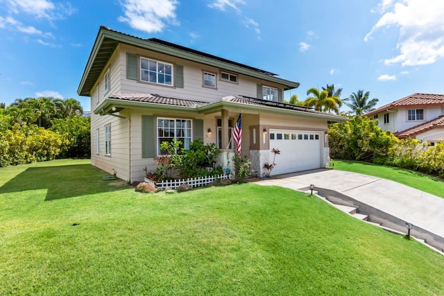 view of front of house featuring a front lawn, a garage, and a porch