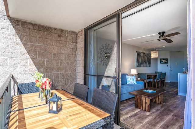 balcony featuring ceiling fan