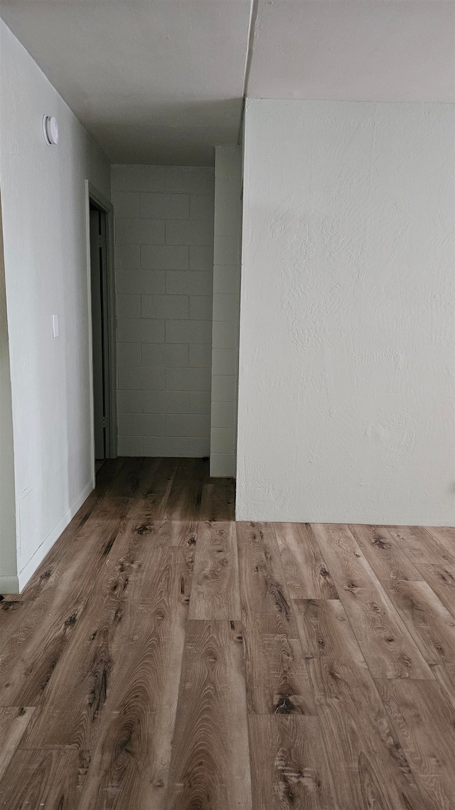 empty room featuring hardwood / wood-style flooring