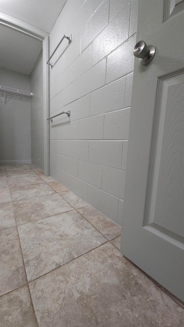 bathroom featuring concrete floors