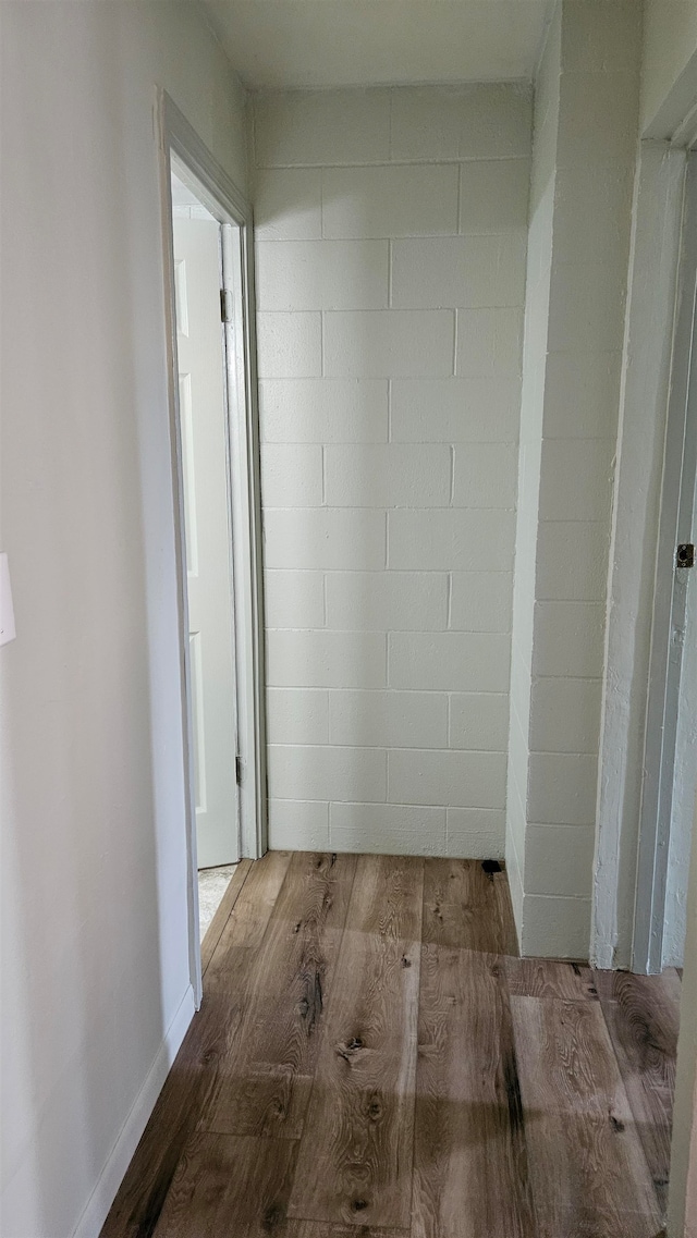 hallway featuring hardwood / wood-style floors