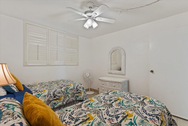 bedroom featuring ceiling fan