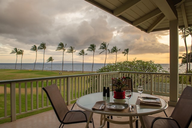 balcony at dusk with a water view