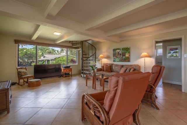 living area with beamed ceiling, light tile patterned floors, and stairway