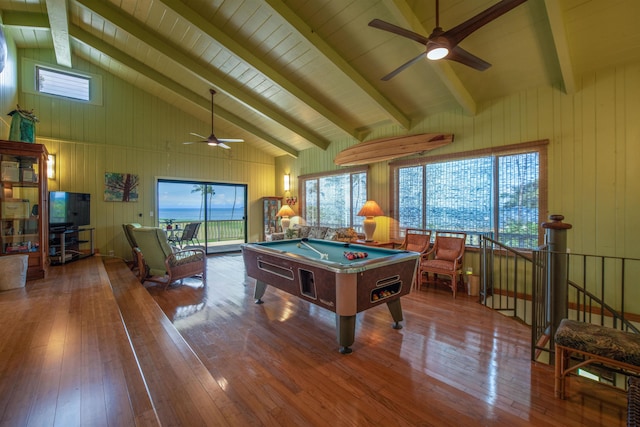 rec room with pool table, a ceiling fan, beamed ceiling, and wood-type flooring
