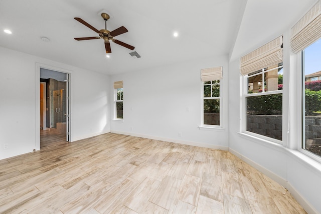 unfurnished room featuring lofted ceiling, light hardwood / wood-style flooring, and ceiling fan