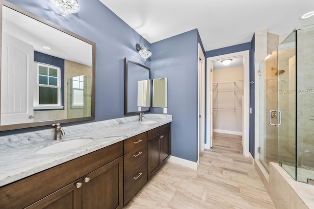 bathroom with vanity and walk in shower