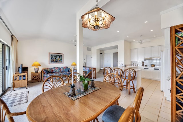 dining room featuring light tile patterned floors, visible vents, recessed lighting, and ceiling fan with notable chandelier
