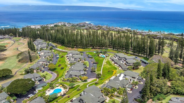 drone / aerial view featuring a water view and a residential view