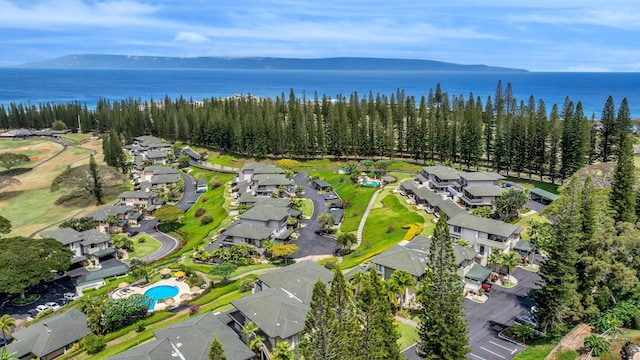 aerial view with a residential view and a water view