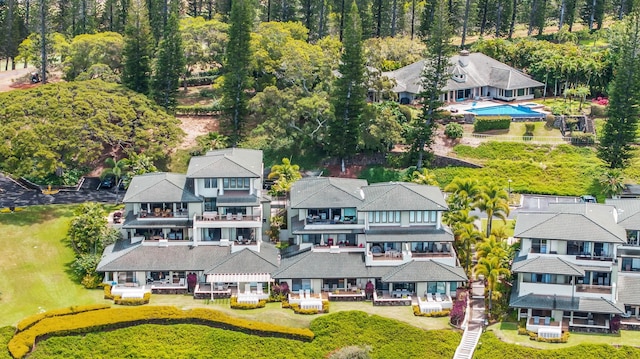 birds eye view of property with a residential view