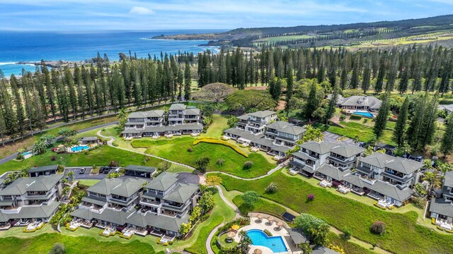 bird's eye view featuring a residential view and a water view