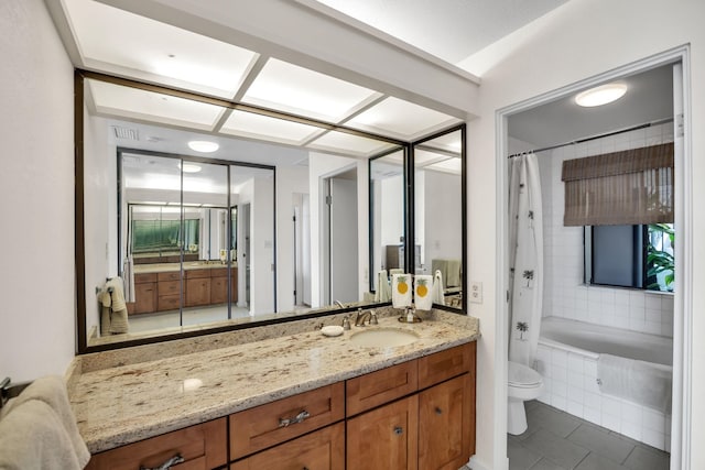 bathroom with tile patterned floors, vanity, and toilet